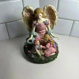 Angel With Children Music Box Plays Mozarts Lullaby